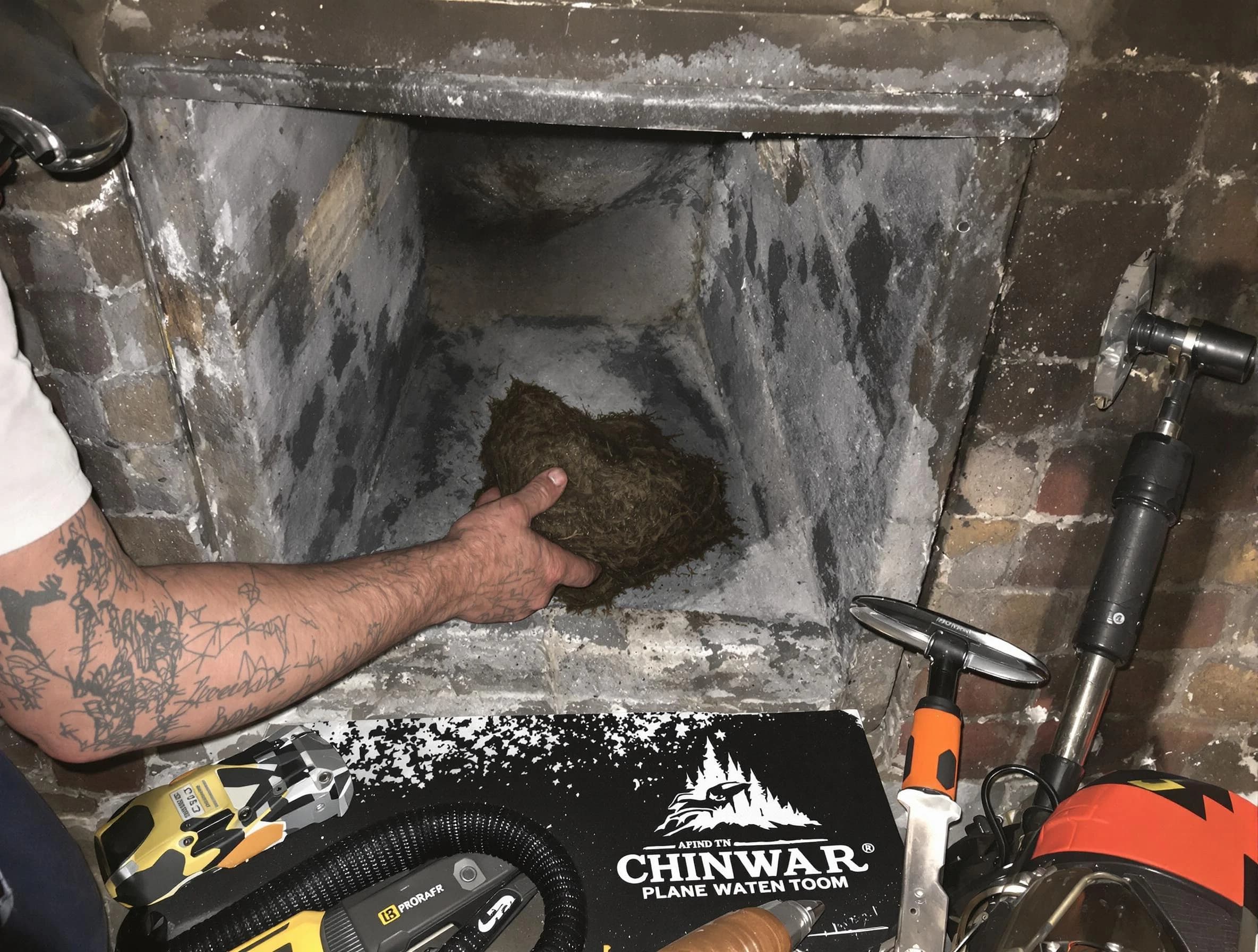 Columbiana Chimney Sweep safely removing debris and screening chimney in Columbiana, AL