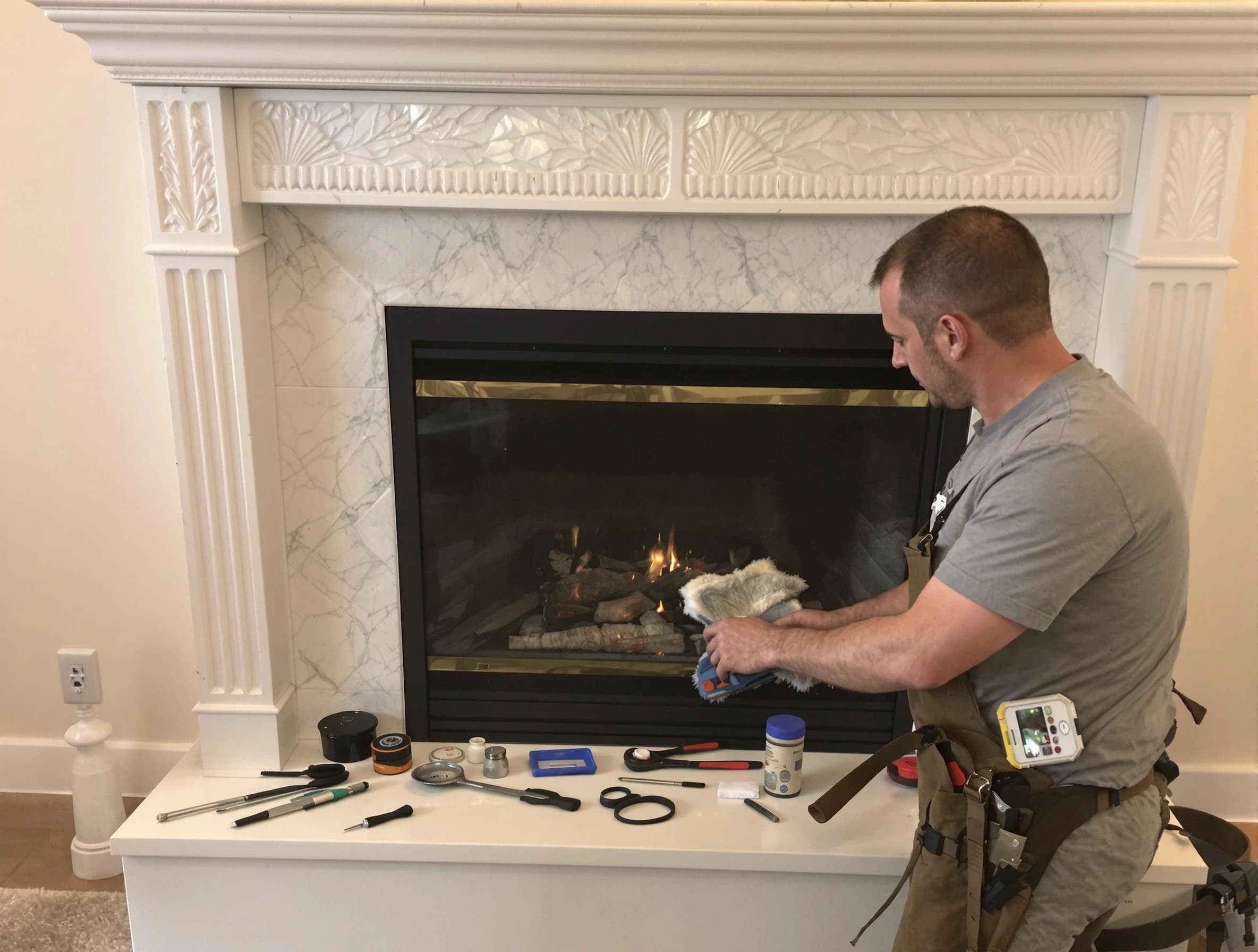 Columbiana Chimney Sweep performing fireplace maintenance in Columbiana, AL